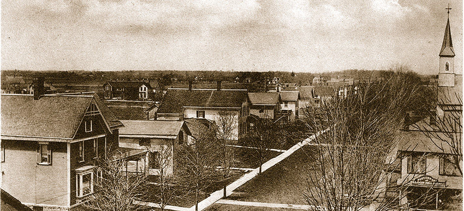 Postcard view looking north up Old Falld Blvd